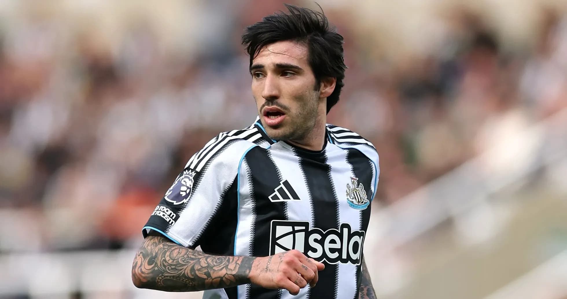 Player in Newcastle United kit during match Player in Newcastle United kit during match
