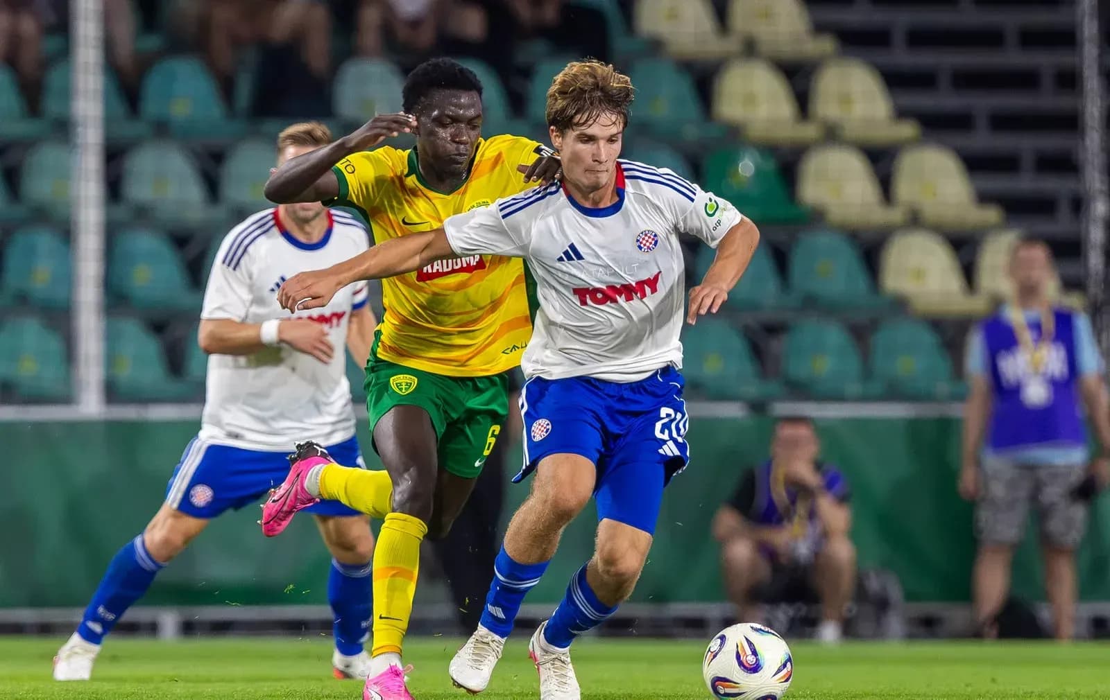 Player tackling during HNK Hajduk Split match Player tackling during HNK Hajduk Split match