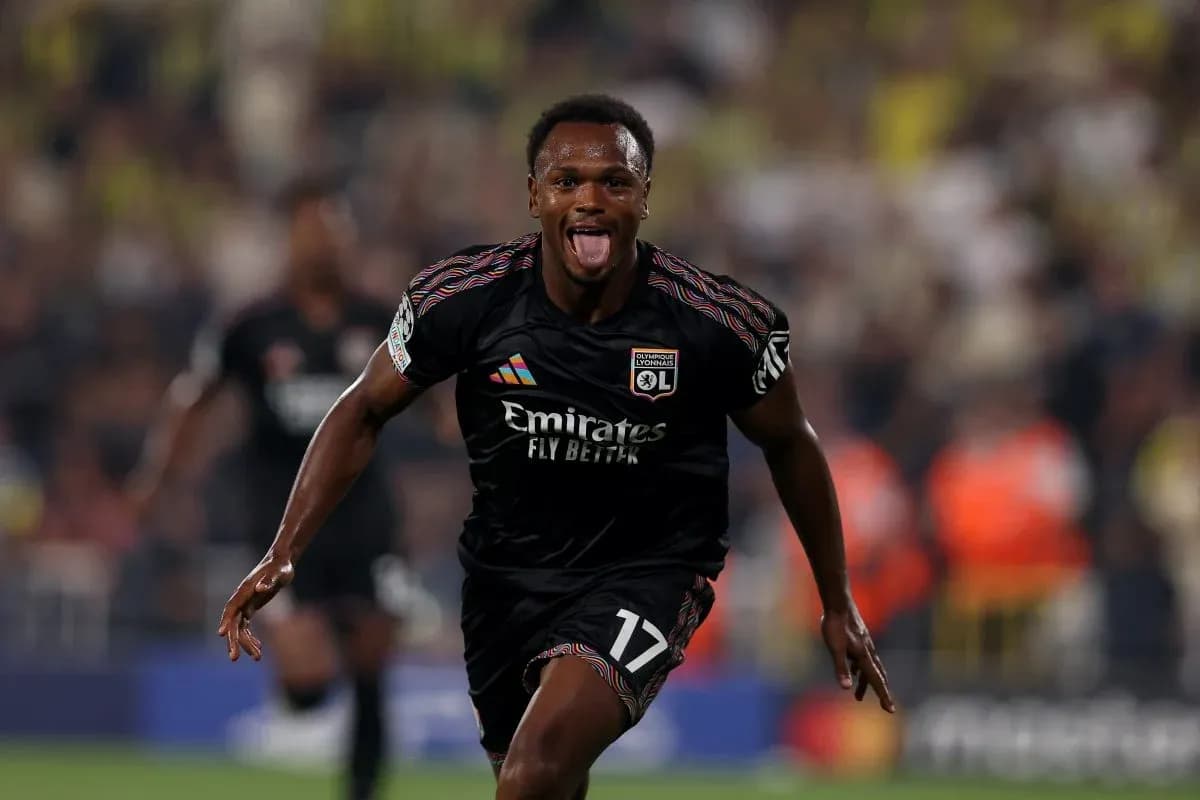 Lyon player celebrating goal during Champions League match Lyon player celebrating goal during Champions League match