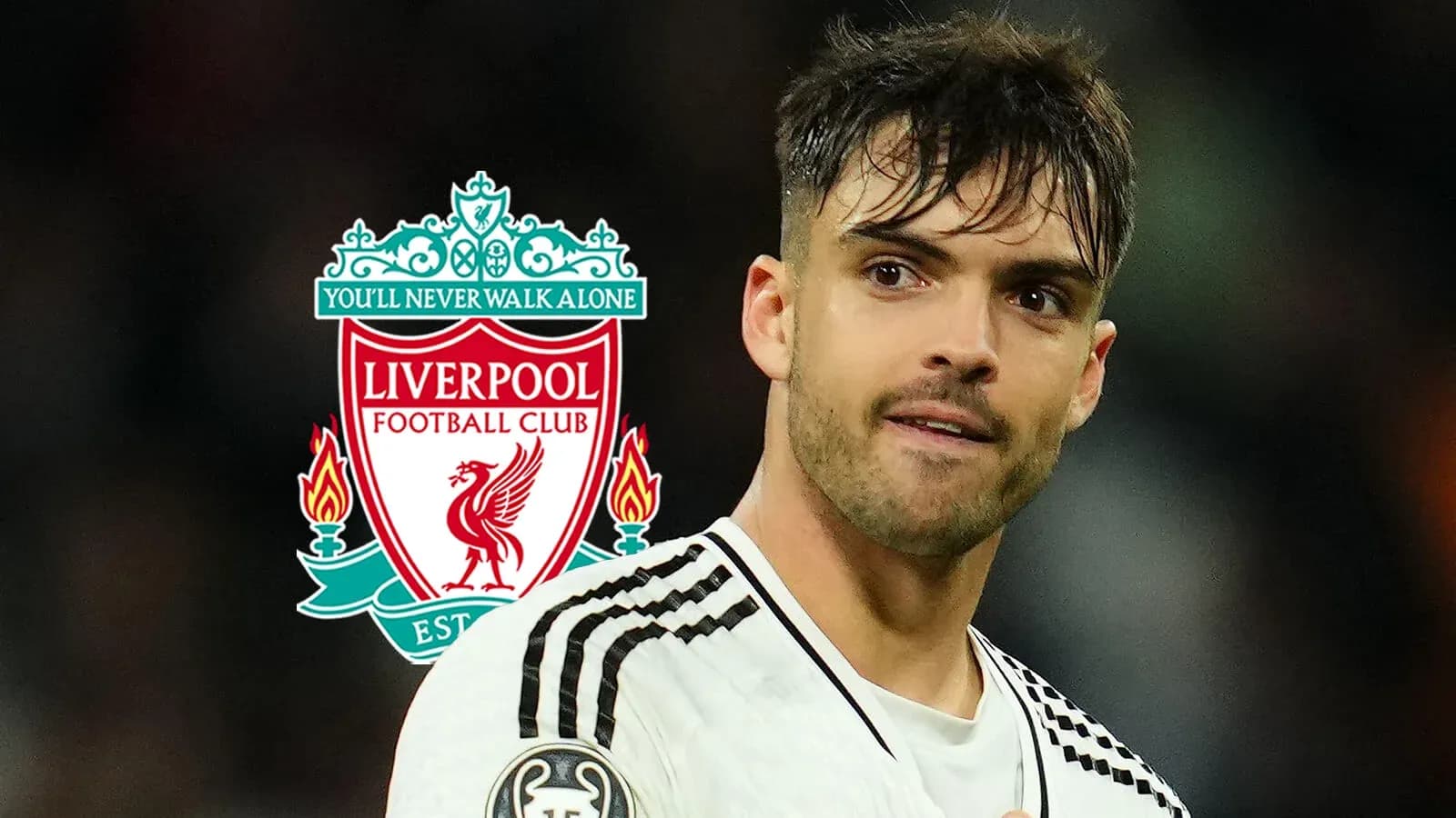 Player in front of Liverpool FC logo during match Player in front of Liverpool FC logo during match