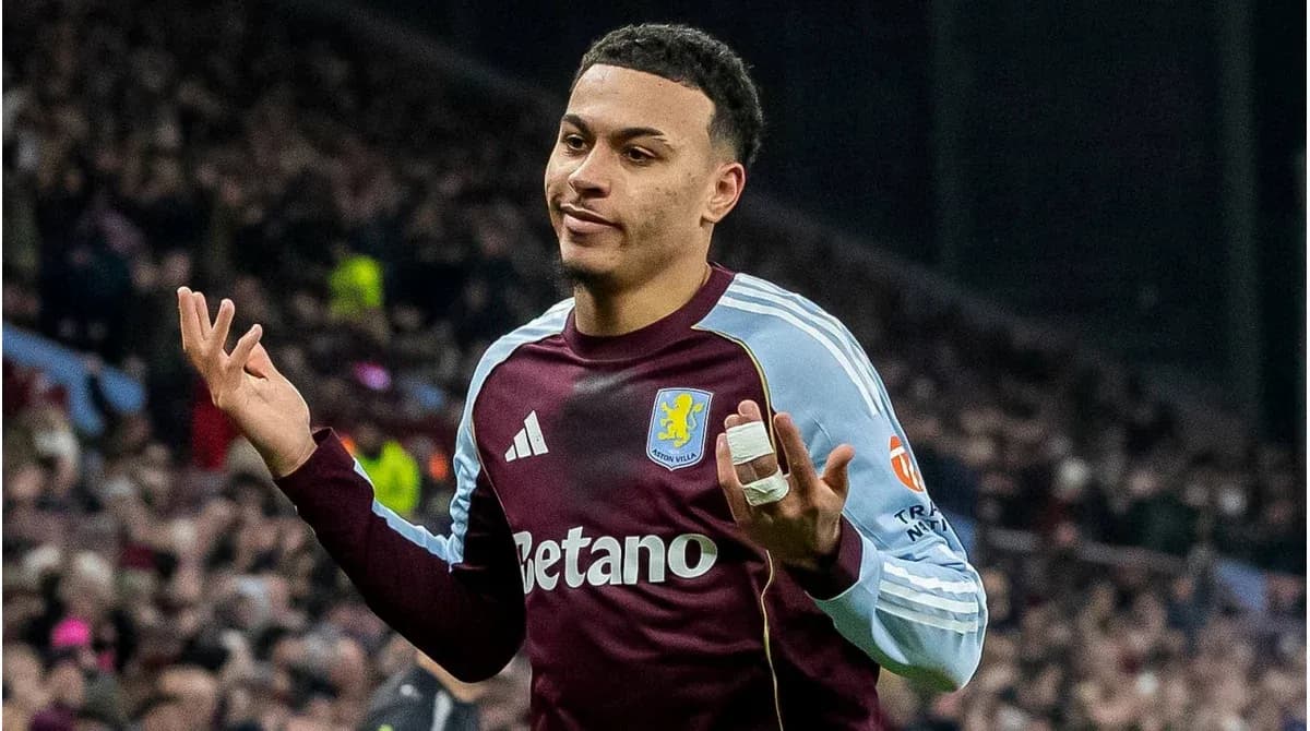 Player gesturing during a football match Player gesturing during a football match