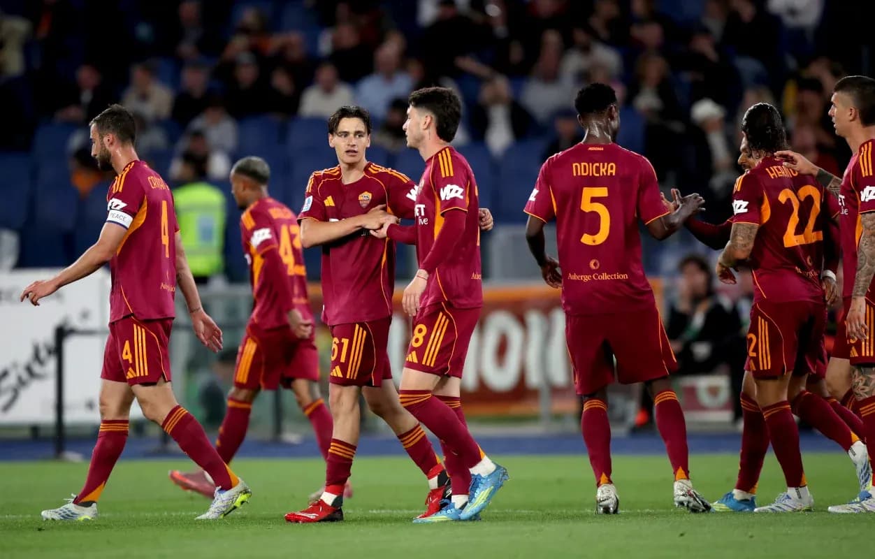AS Roma players celebrating during a match AS Roma players celebrating during a match