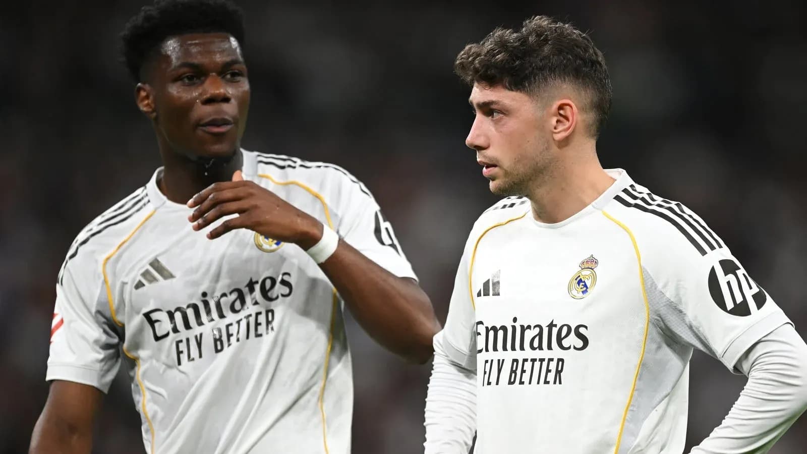 Two Real Madrid players discussing during match Two Real Madrid players discussing during match