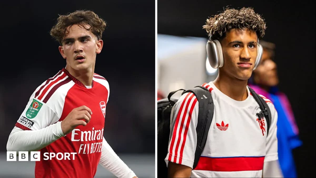 Two young football players in Arsenal jerseys Two young football players in Arsenal jerseys