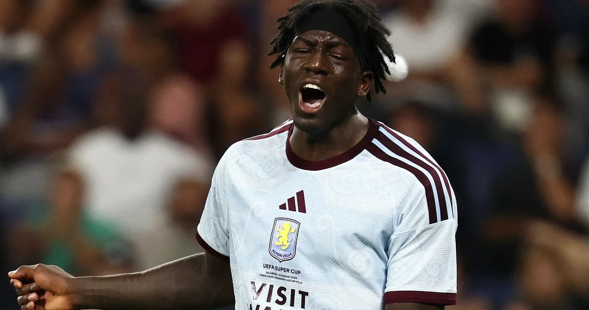 Player shouting during match wearing Aston Villa jersey Player shouting during match wearing Aston Villa jersey