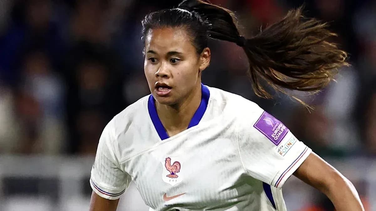Player running with the ball during a match Player running with the ball during a match