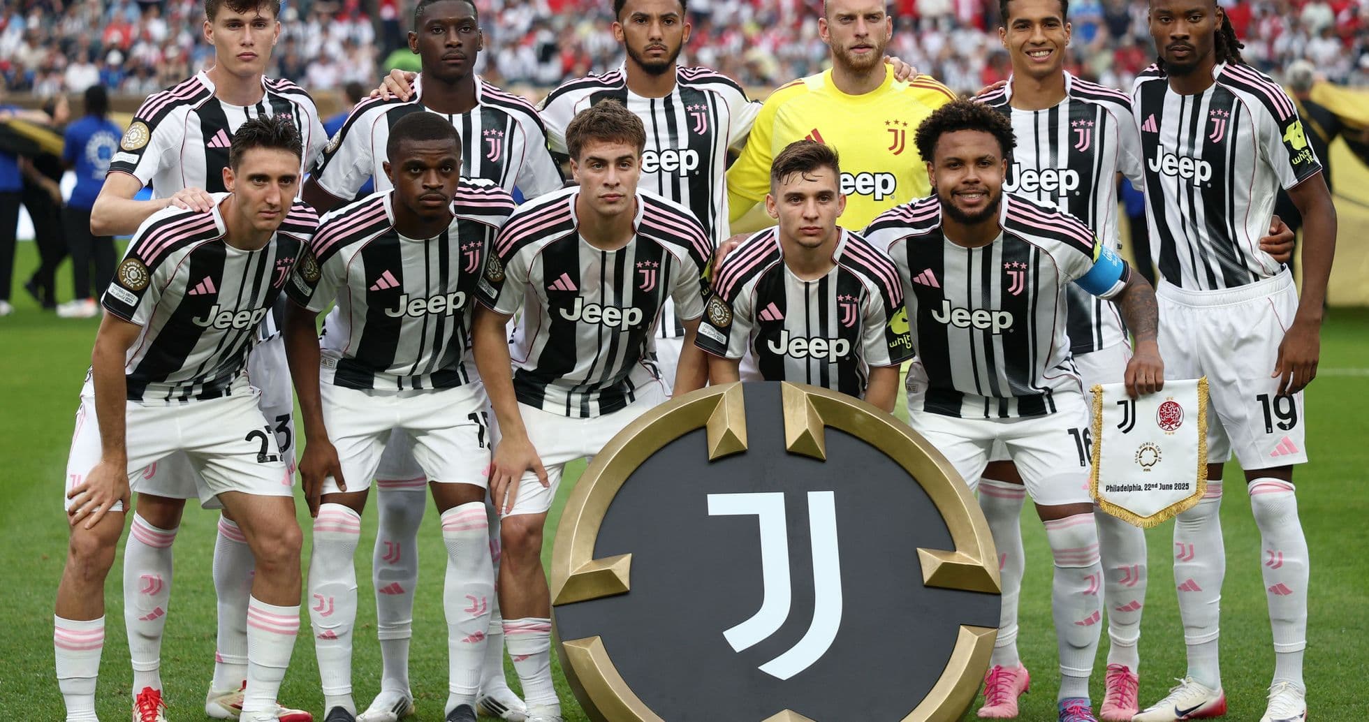 Juventus team posing with club emblem before match Juventus team posing with club emblem before match