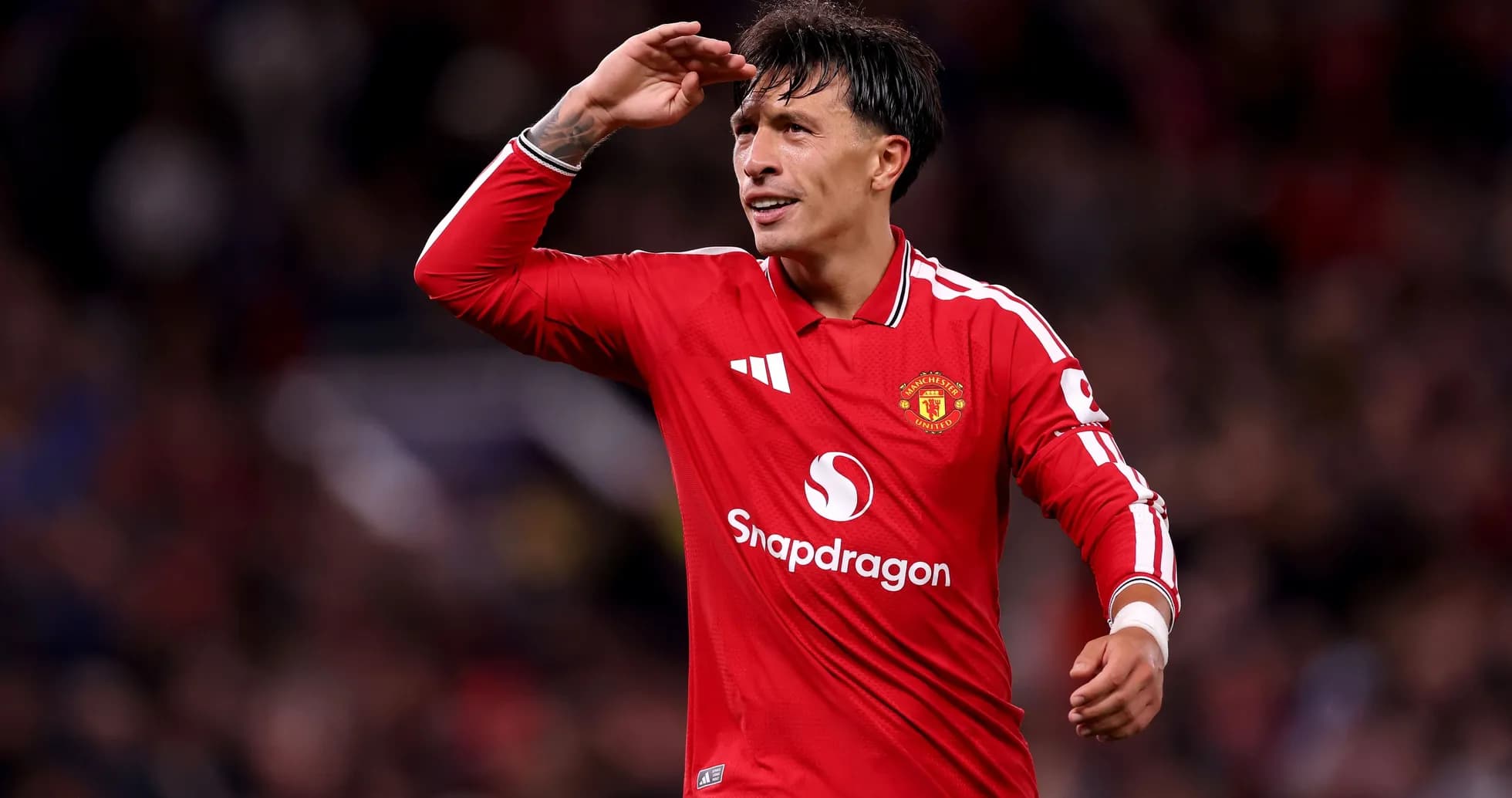 Player celebrating in Manchester United jersey on field Player celebrating in Manchester United jersey on field