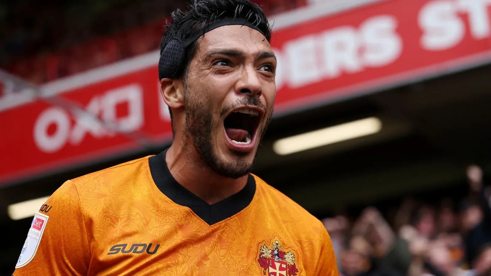 Player celebrating passionately during a match Player celebrating passionately during a match
