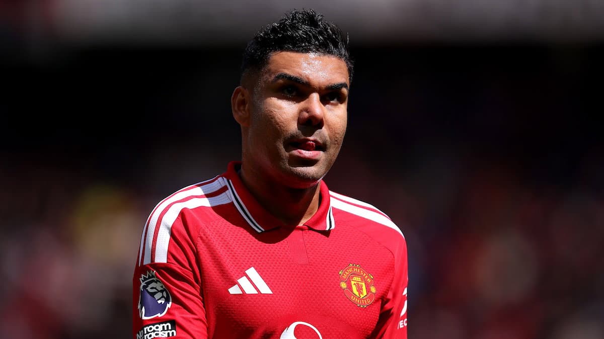 Player in Manchester United kit on field Player in Manchester United kit on field