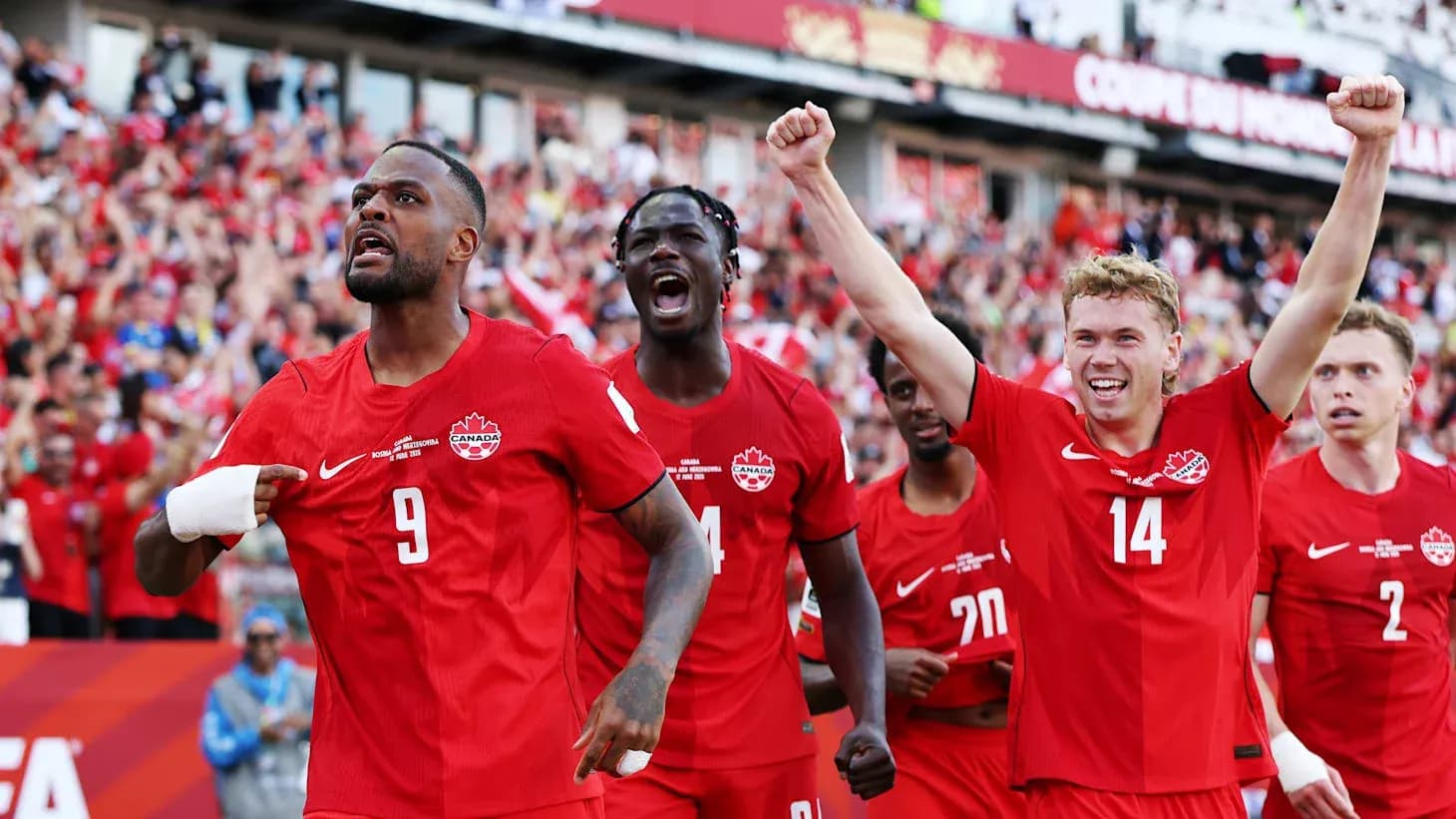 Canada players celebrating during World Cup match Canada players celebrating during World Cup match