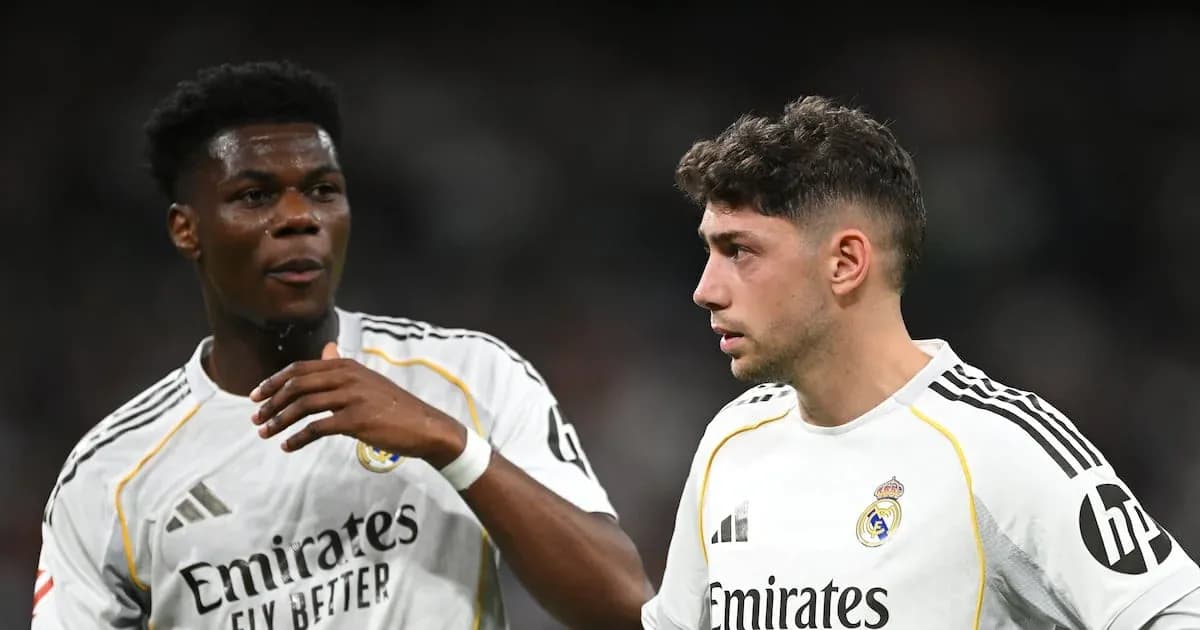 Two Real Madrid players discussing on the field Two Real Madrid players discussing on the field