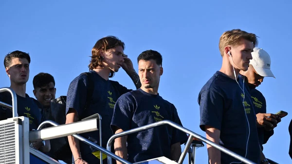 Players arriving at training facility in team attire Players arriving at training facility in team attire