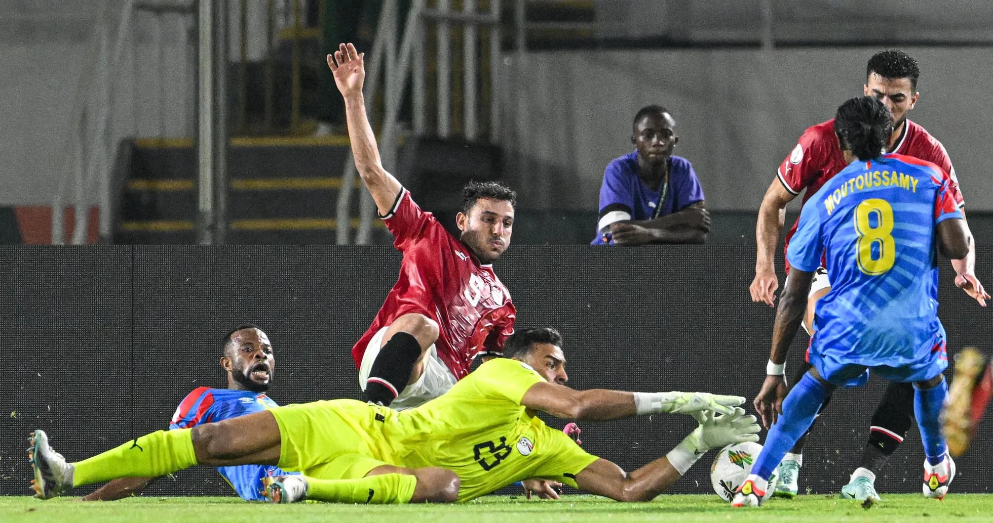 Players contesting for the ball during a match Players contesting for the ball during a match