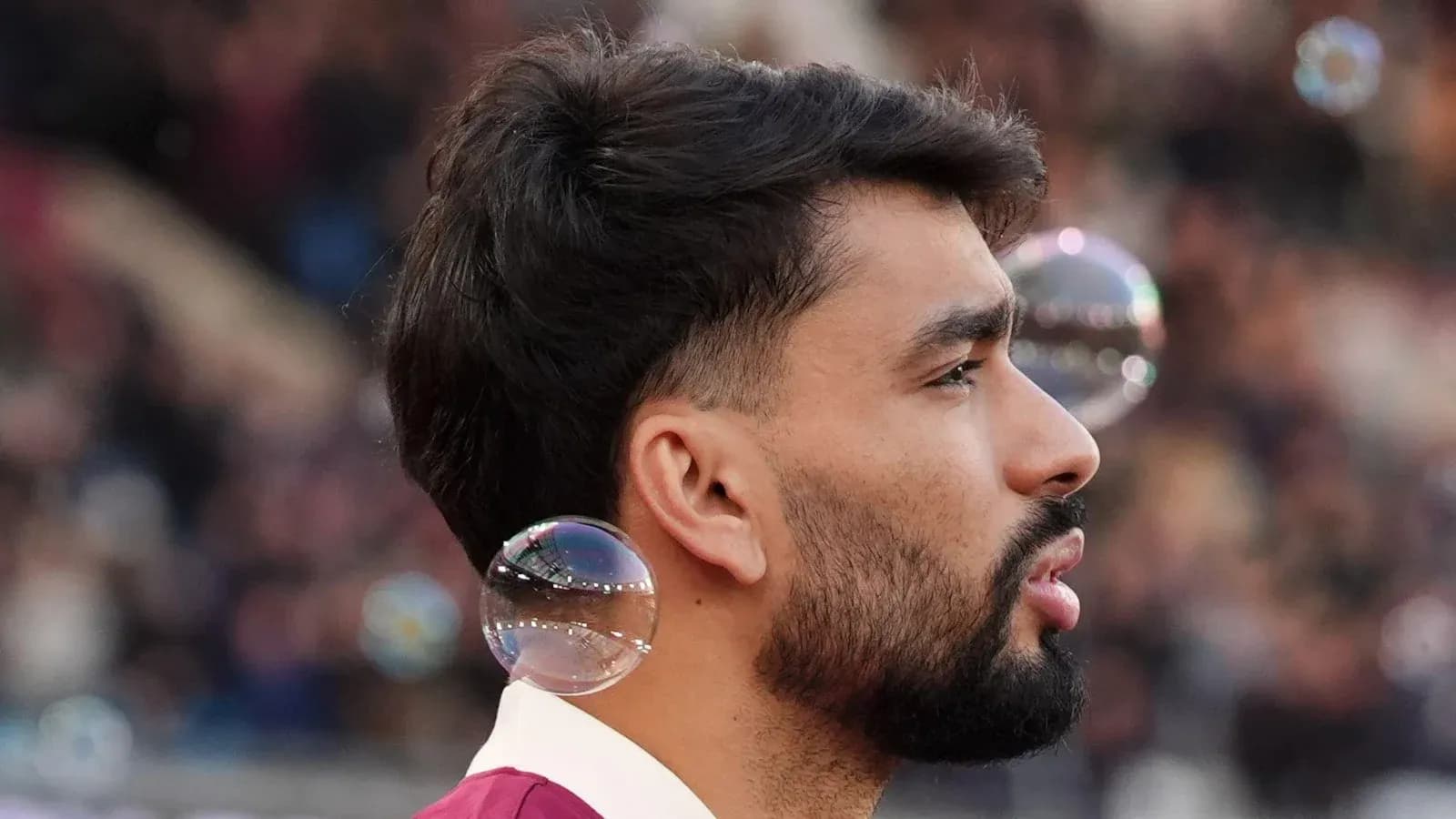 Player with bubbles during a match warm-up Player with bubbles during a match warm-up
