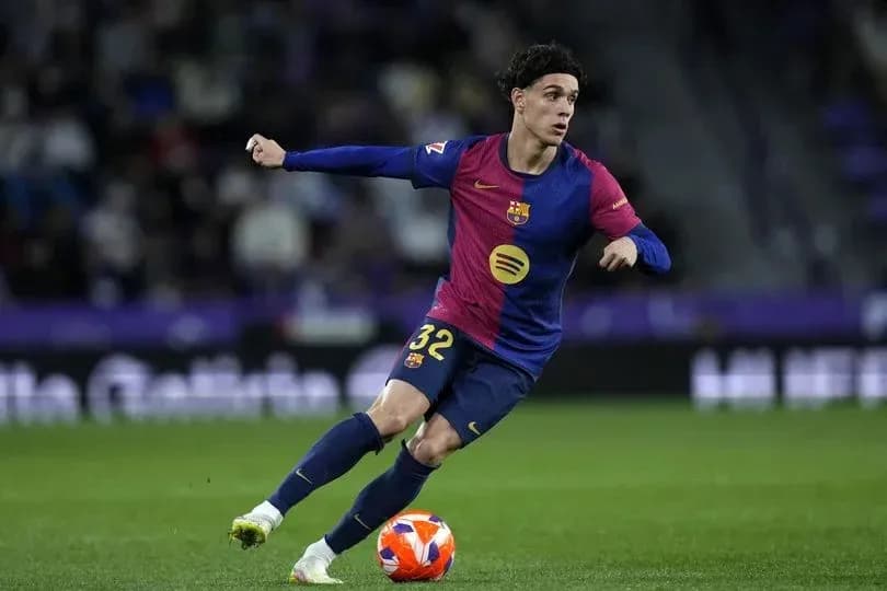 Barcelona player dribbling the ball during match Barcelona player dribbling the ball during match