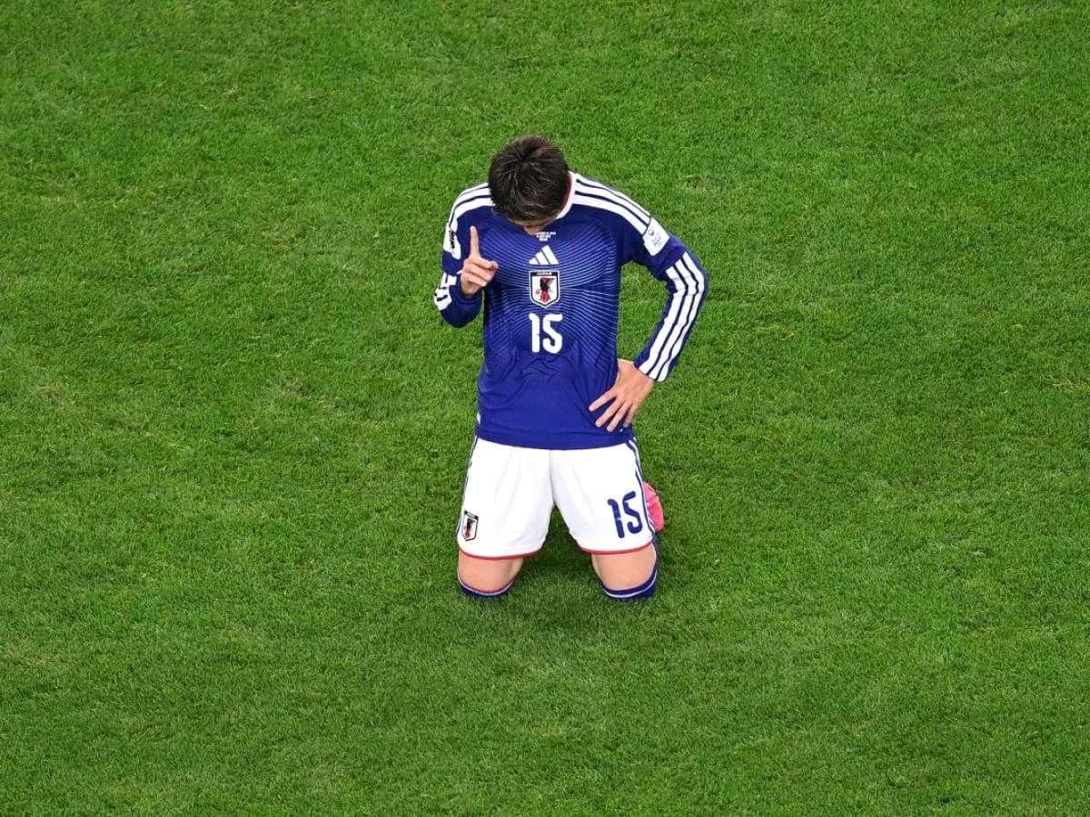Japanese player kneeling during World Cup match Japanese player kneeling during World Cup match