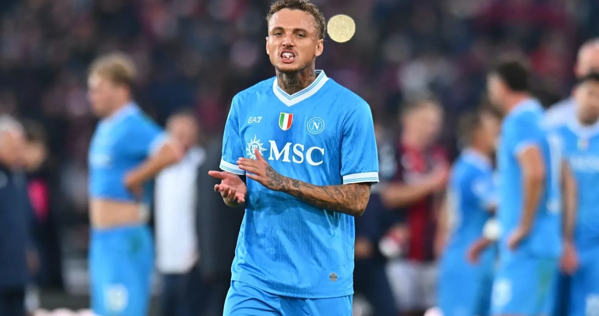 Player in blue Napoli kit gestures on the field Player in blue Napoli kit gestures on the field