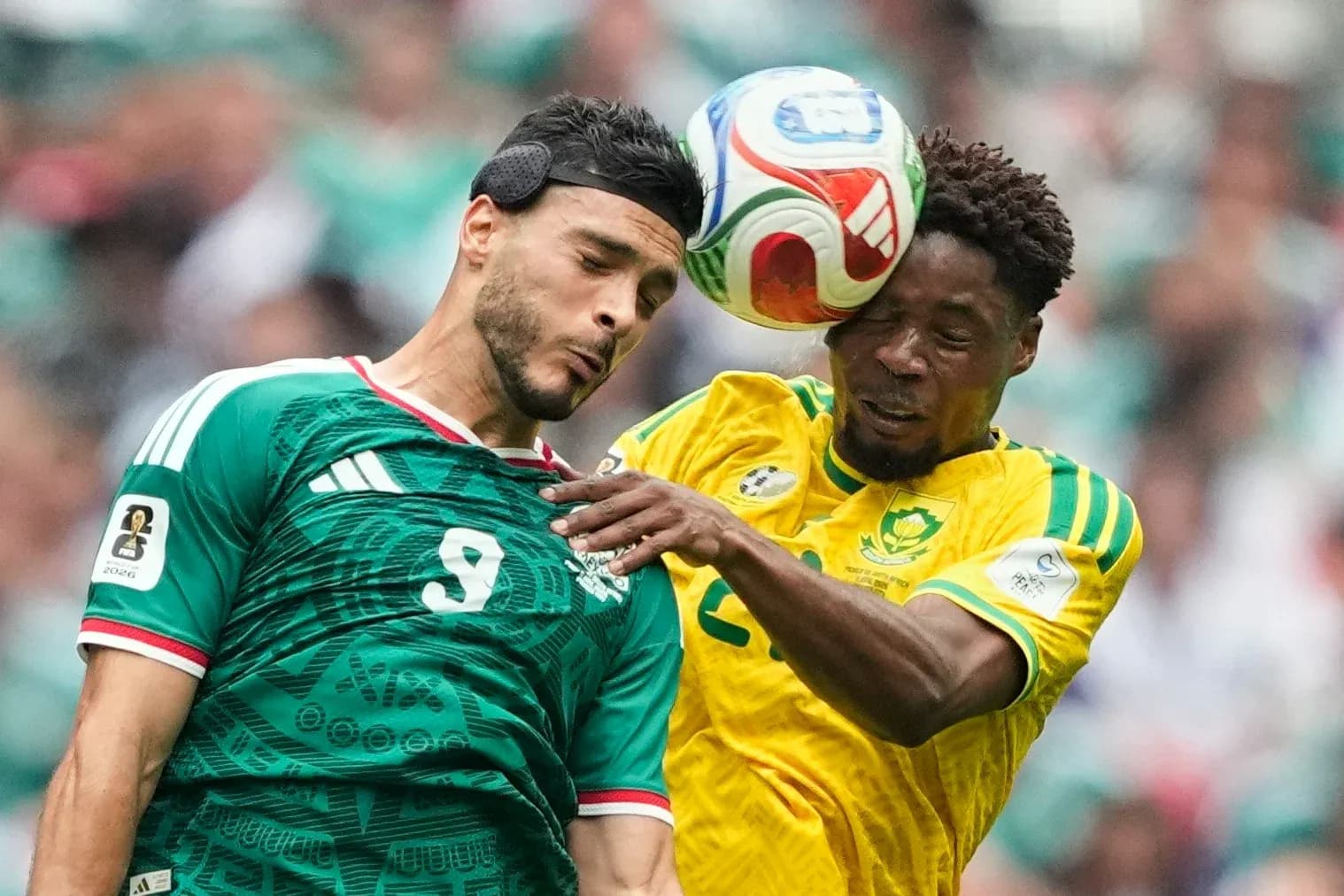Player heads the ball during Mexico vs South Africa match Player heads the ball during Mexico vs South Africa match