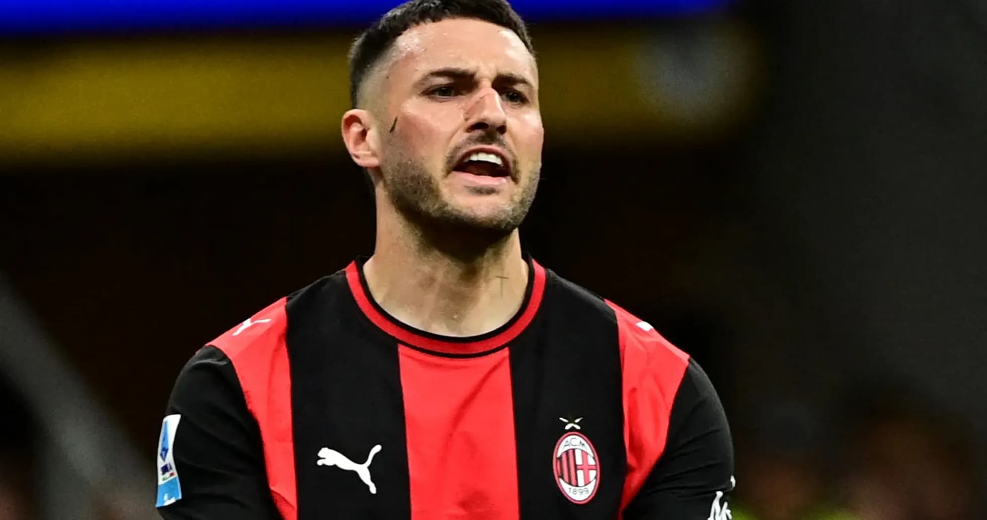 Player in AC Milan jersey during match action Player in AC Milan jersey during match action