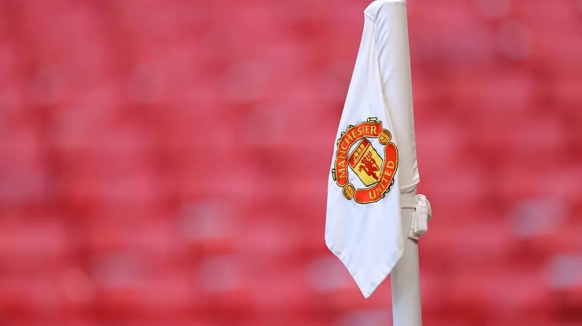 Corner flag with Manchester United logo displayed Corner flag with Manchester United logo displayed