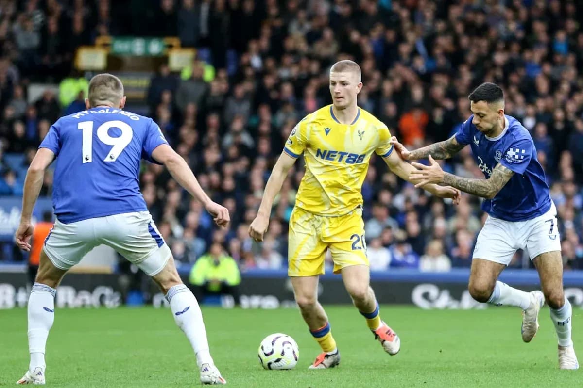 Players contesting for the ball during a match Players contesting for the ball during a match