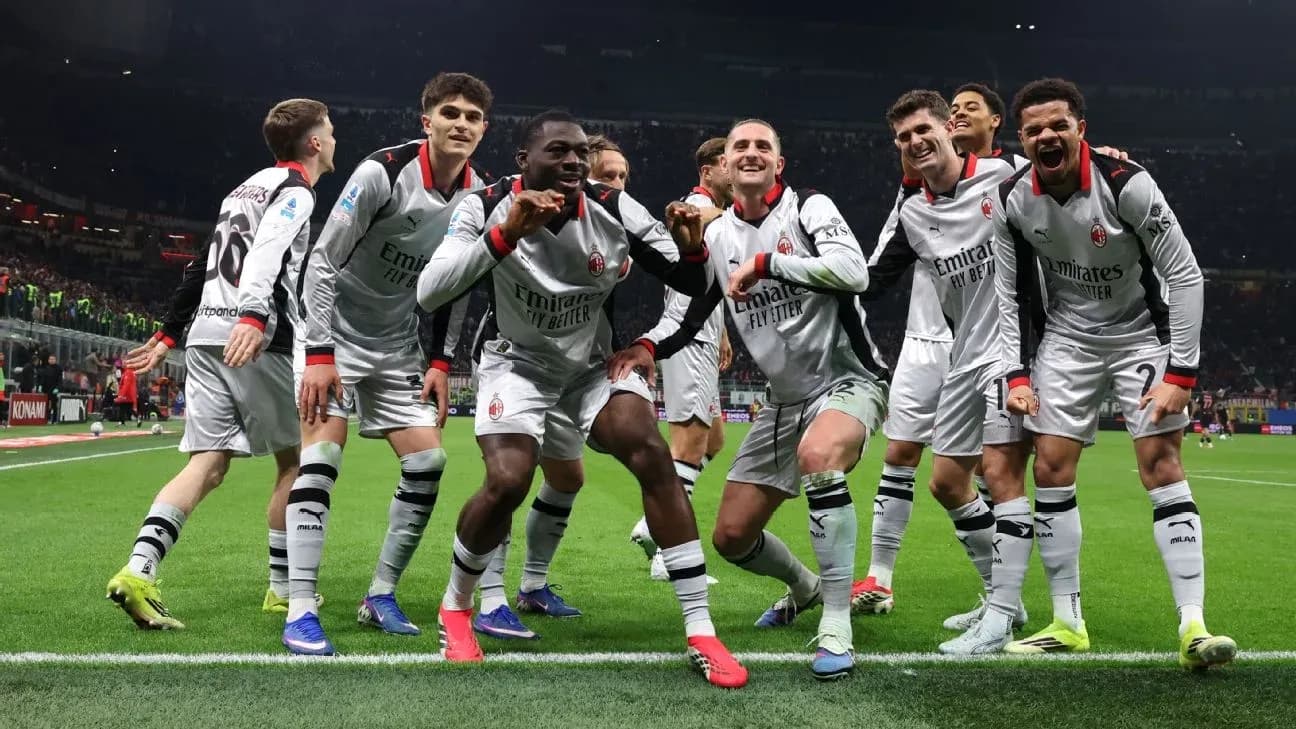 AC Milan players celebrating a goal AC Milan players celebrating a goal
