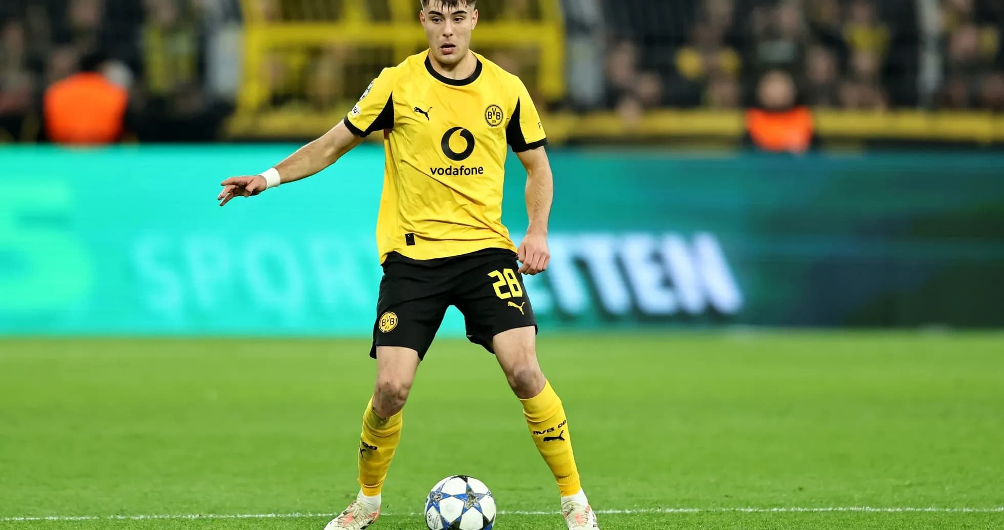Borussia Dortmund player preparing for a free kick Borussia Dortmund player preparing for a free kick