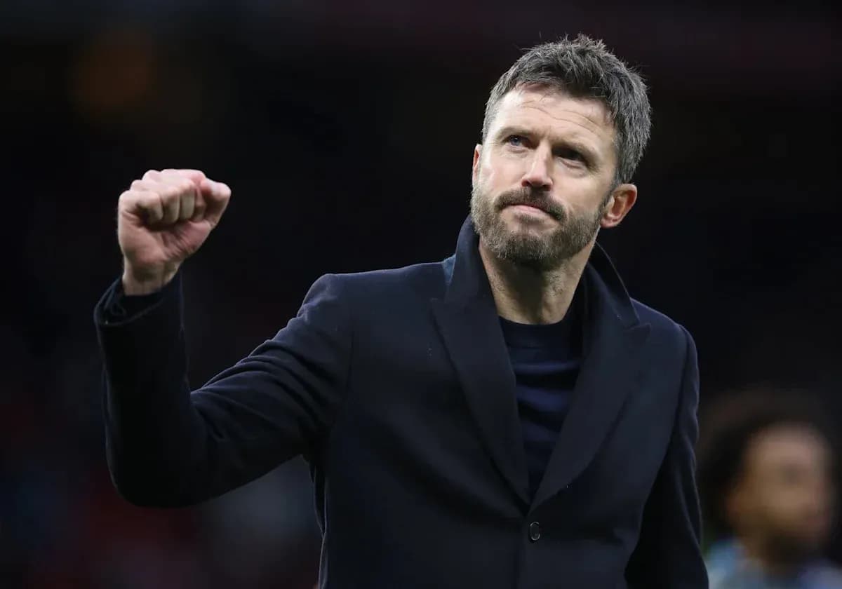 Coach celebrating with raised fist after match Coach celebrating with raised fist after match