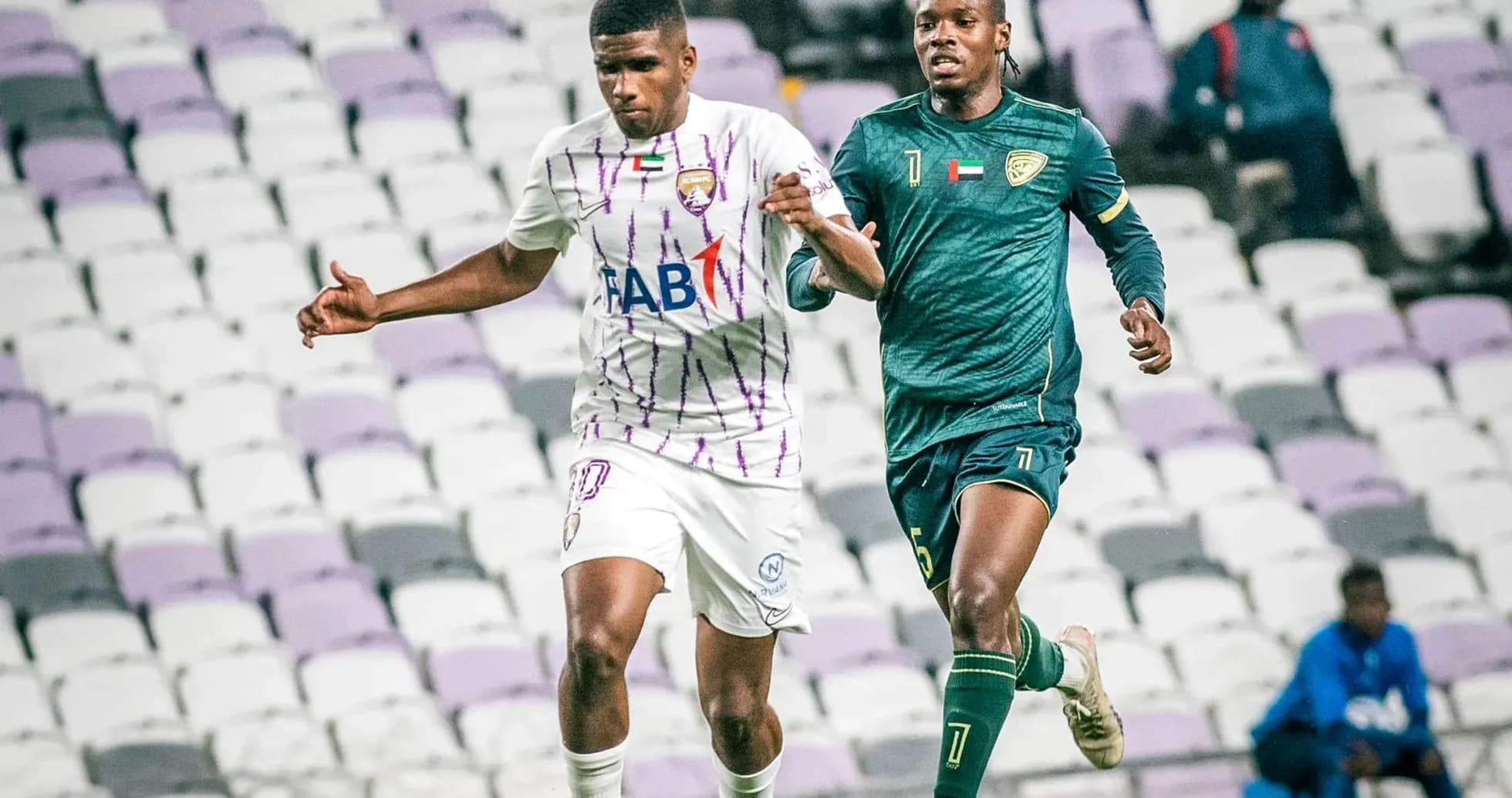 Al Wahda U23 player dribbling past Khorfakkan U23 goalkeeper Al Wahda U23 player dribbling past Khorfakkan U23 goalkeeper