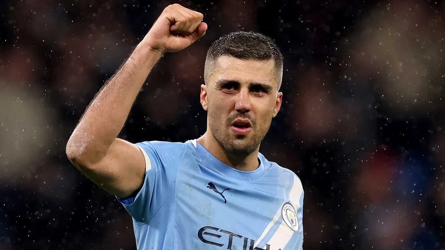 Player celebrating after scoring a goal for Manchester City Player celebrating after scoring a goal for Manchester City
