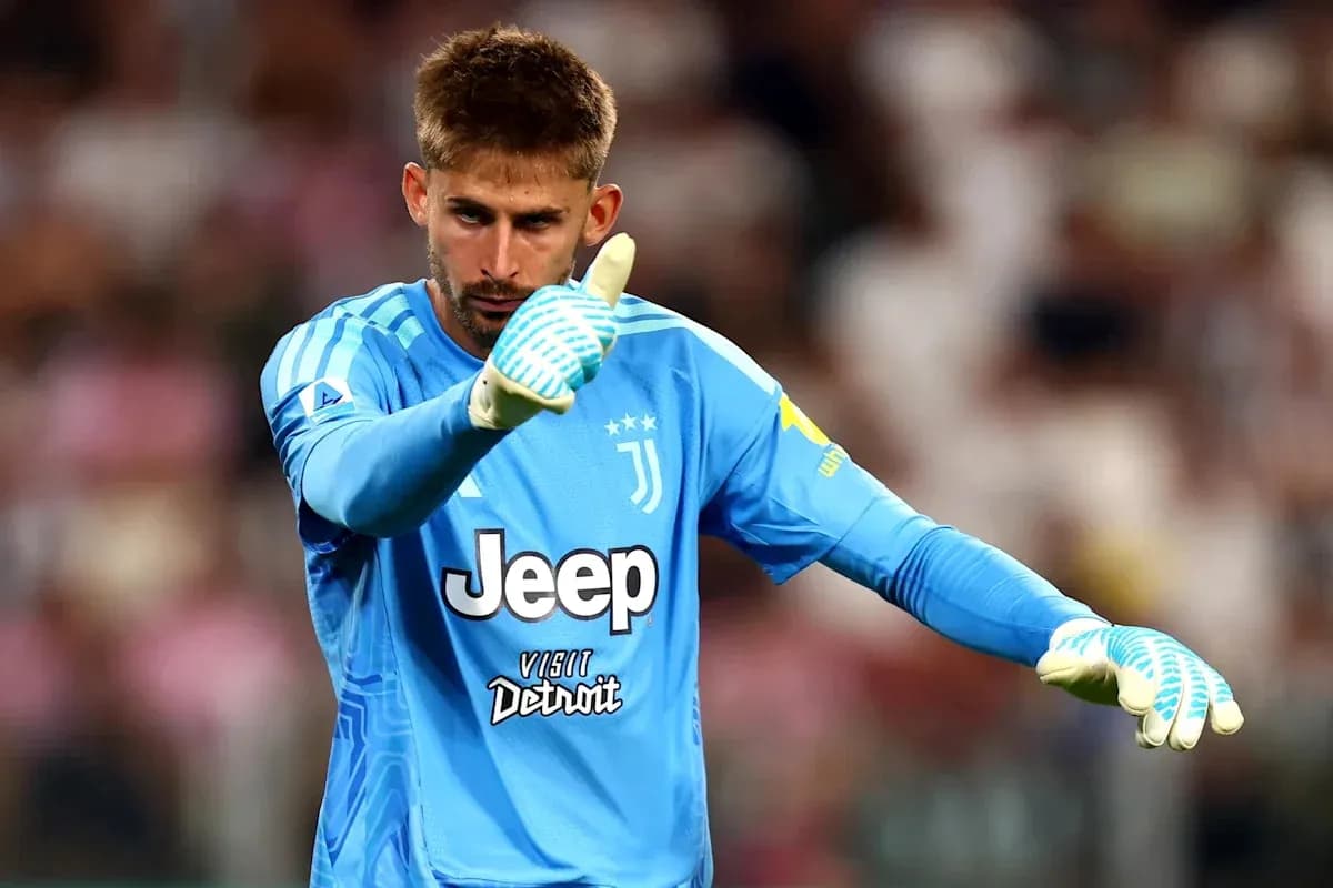 Goalkeeper in blue kit giving thumbs up gesture Goalkeeper in blue kit giving thumbs up gesture