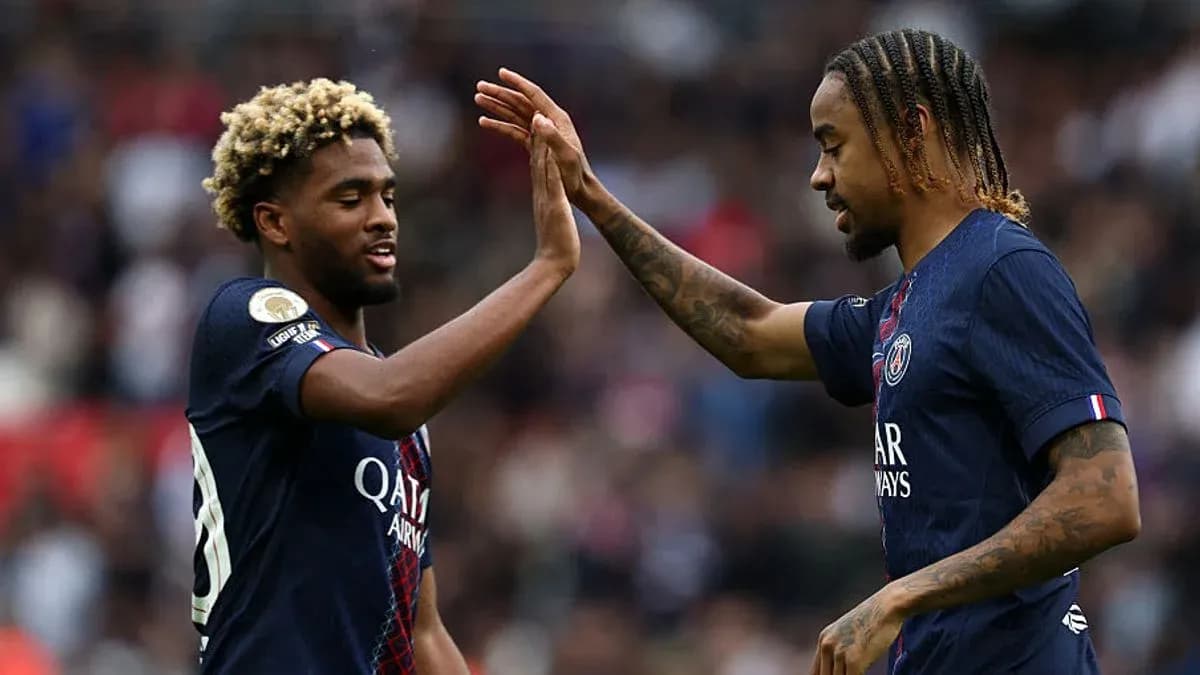 Two Paris Saint-Germain players celebrating a goal Two Paris Saint-Germain players celebrating a goal
