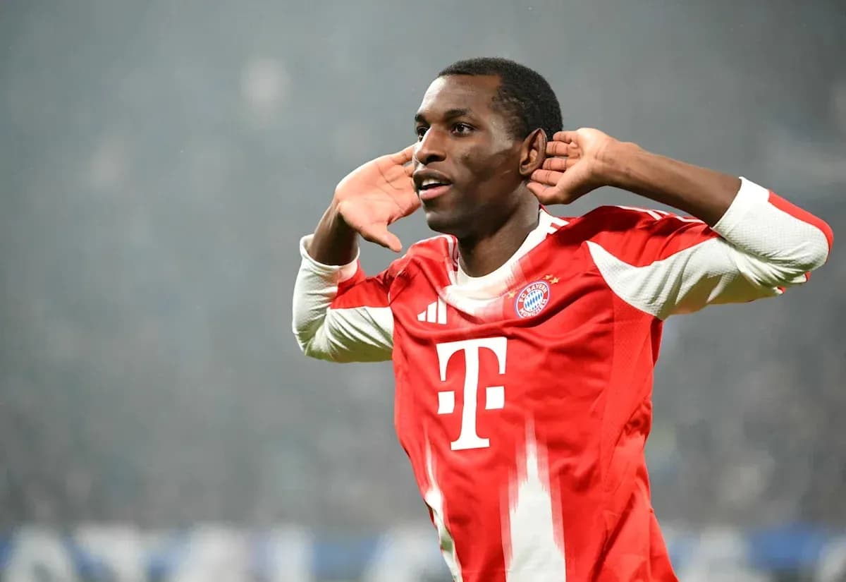 Player celebrating a goal with hands to ears Player celebrating a goal with hands to ears