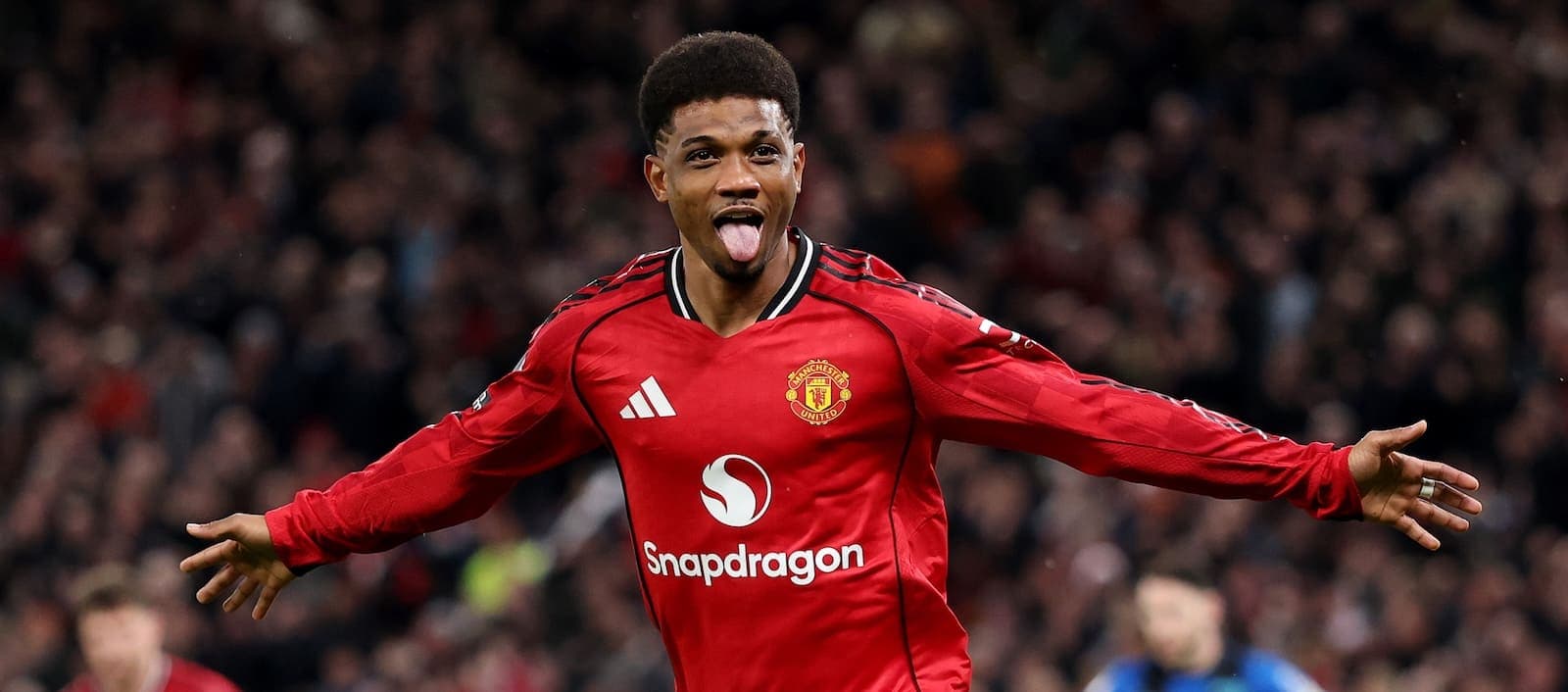 Player celebrating after scoring a goal Player celebrating after scoring a goal