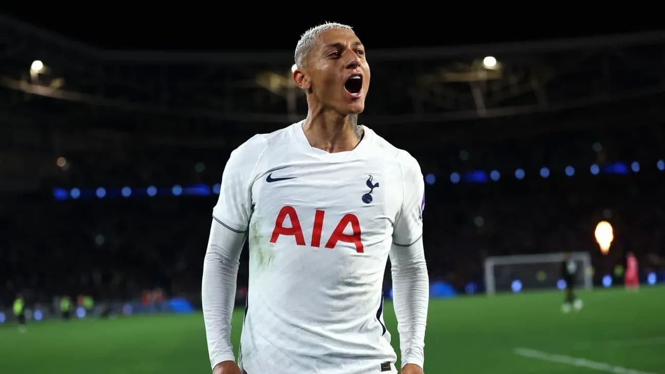 Player celebrating a goal on the pitch Player celebrating a goal on the pitch