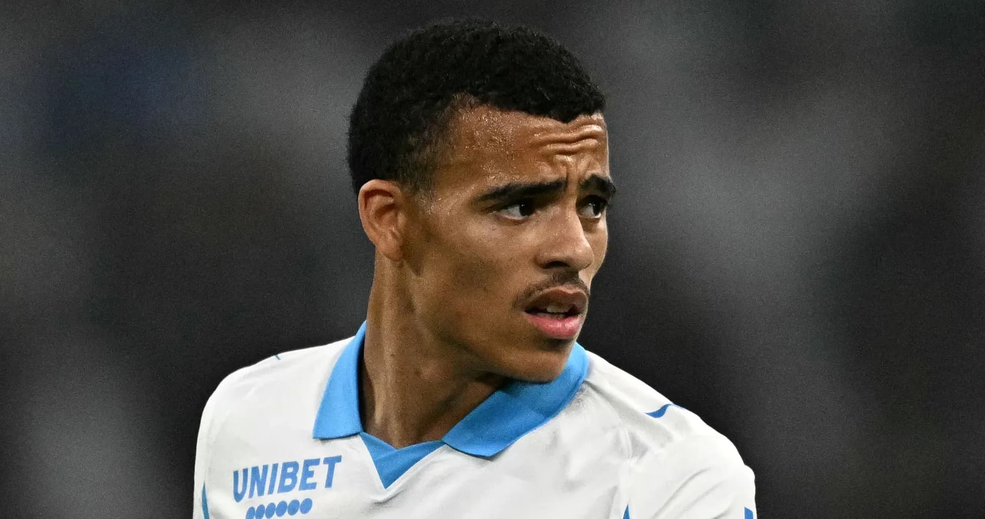 Player in action during a football match Player in action during a football match