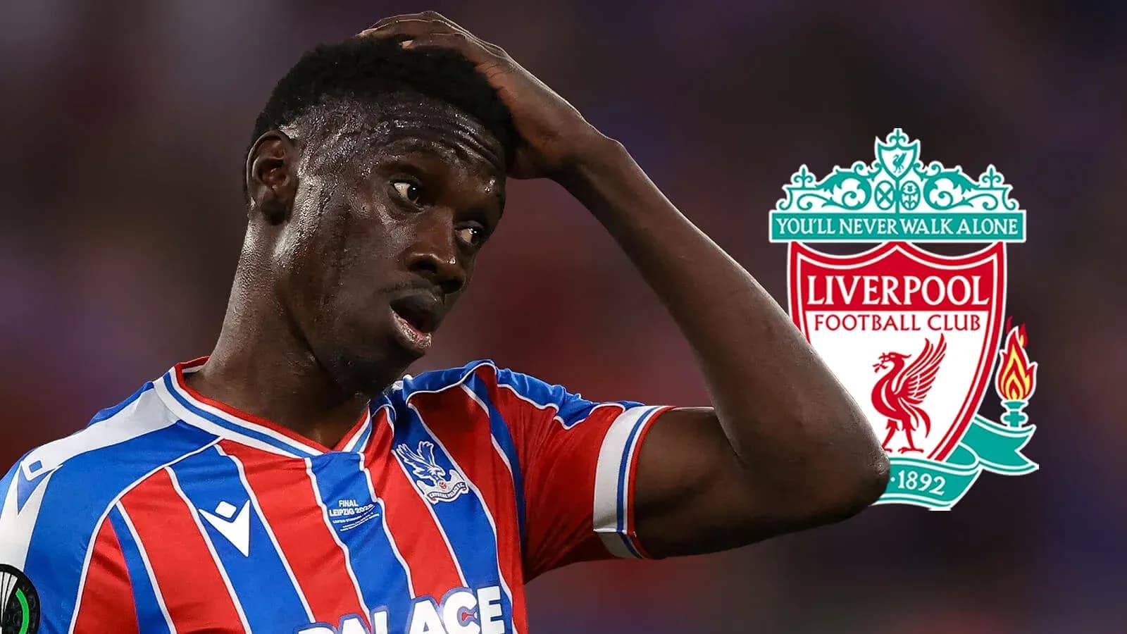 Crystal Palace player reacting during match with Liverpool logo Crystal Palace player reacting during match with Liverpool logo