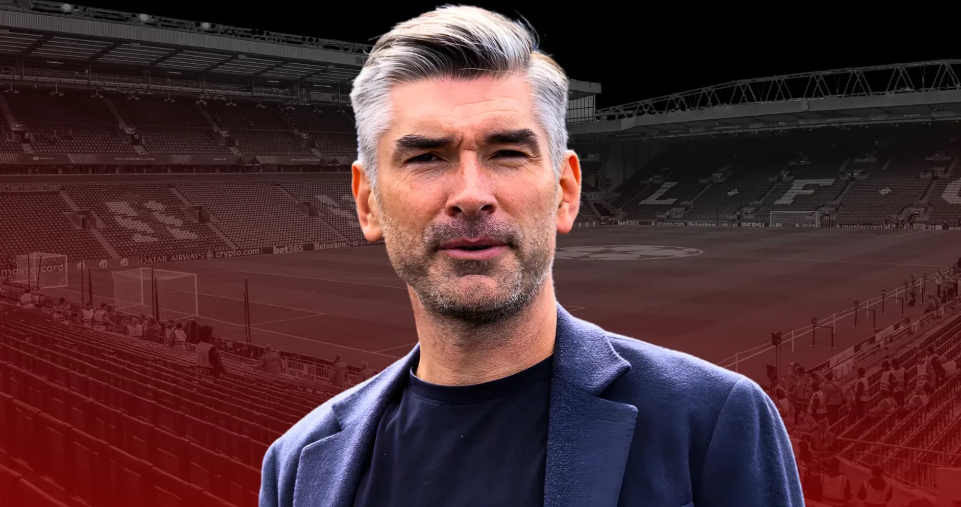 Person standing in front of stadium before match Person standing in front of stadium before match