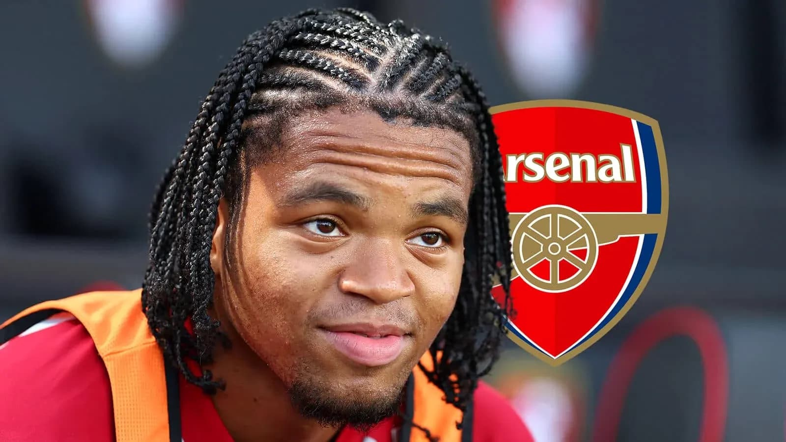 Player with braided hair in Arsenal kit Player with braided hair in Arsenal kit