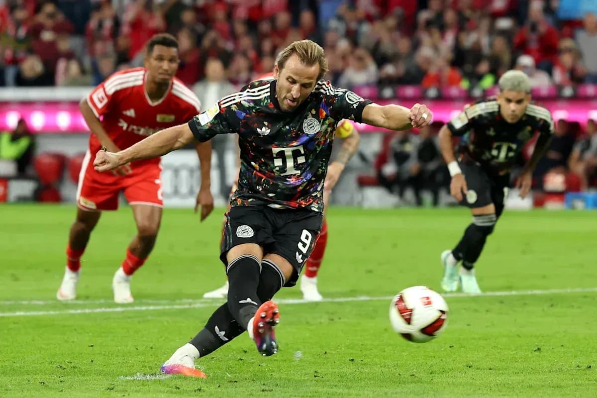 Player taking a penalty kick during a match Player taking a penalty kick during a match