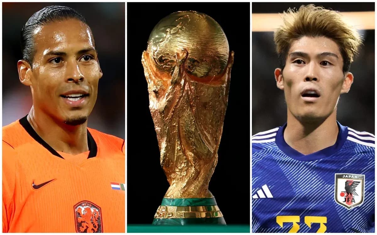 Virgil van Dijk and player from Japan with trophy Virgil van Dijk and player from Japan with trophy
