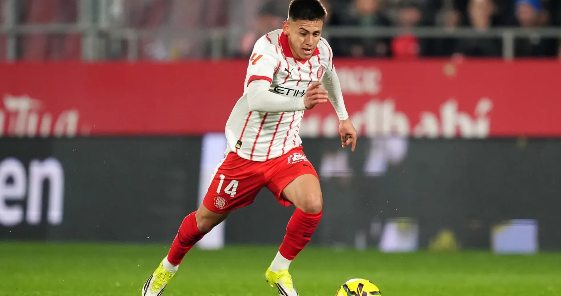Player dribbling the ball during La Liga match Player dribbling the ball during La Liga match
