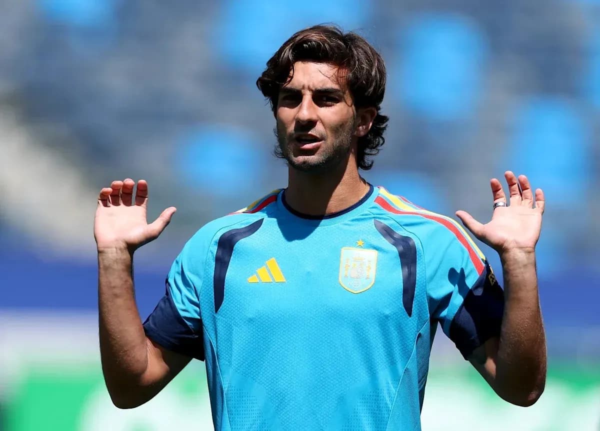 Player gesturing during training session in Spain kit Player gesturing during training session in Spain kit