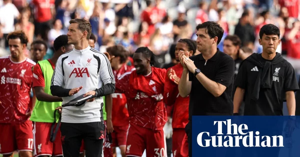 Liverpool players and staff acknowledging fans after match Liverpool players and staff acknowledging fans after match