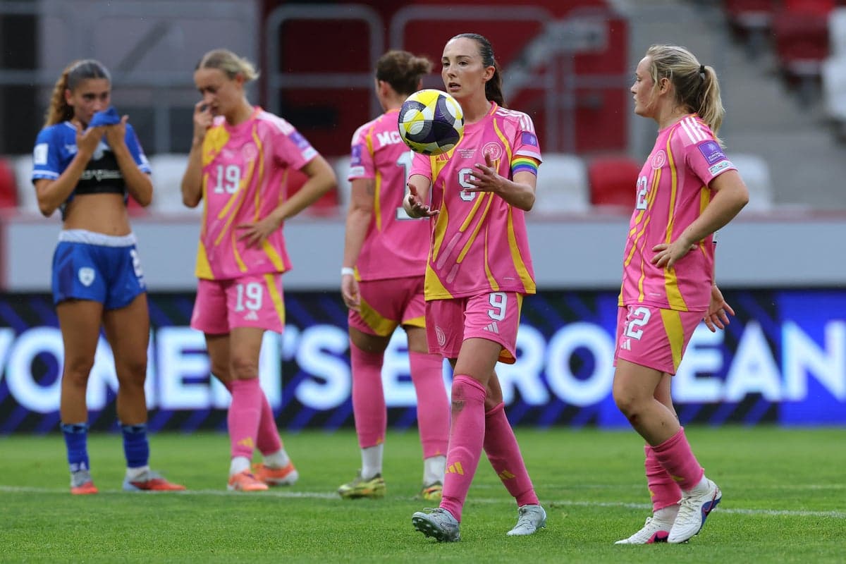 Players in pink and blue jerseys during match Players in pink and blue jerseys during match