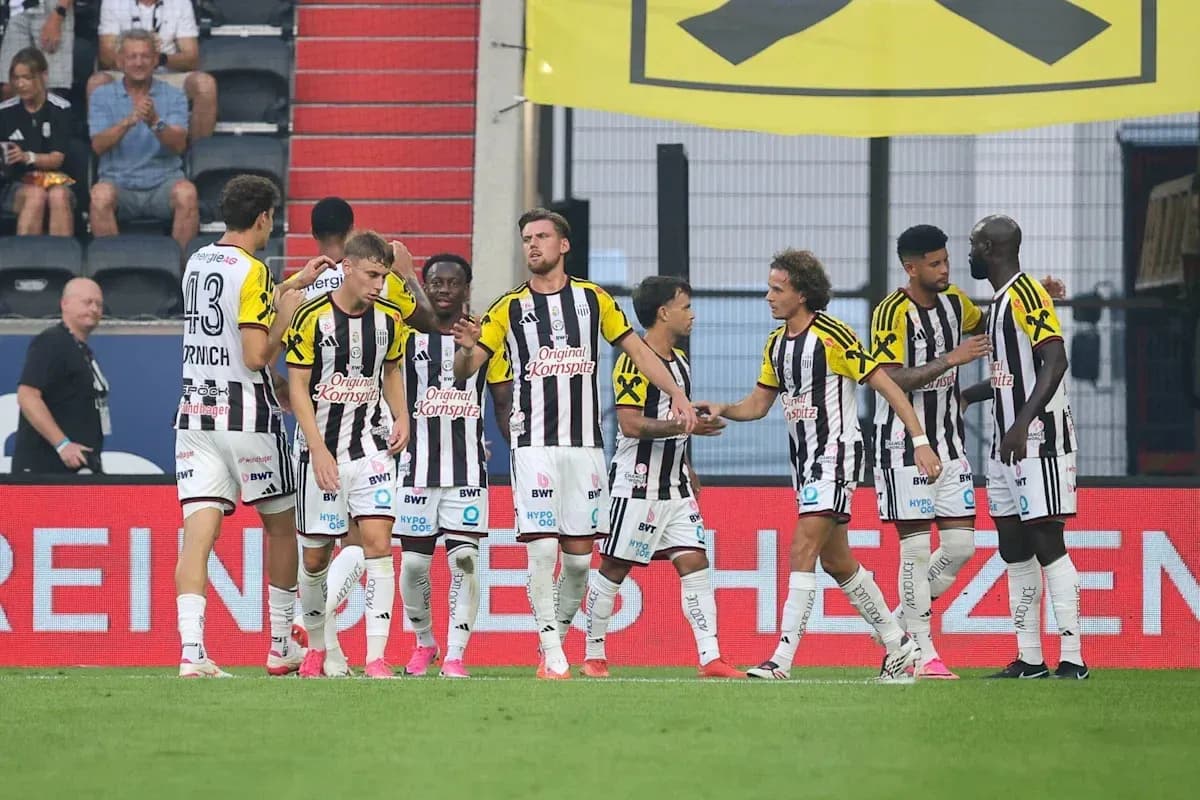 Players celebrating together on the field Players celebrating together on the field