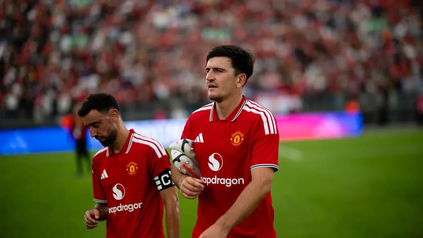 Bruno Fernandes and Harry Maguire walking off the pitch Bruno Fernandes and Harry Maguire walking off the pitch