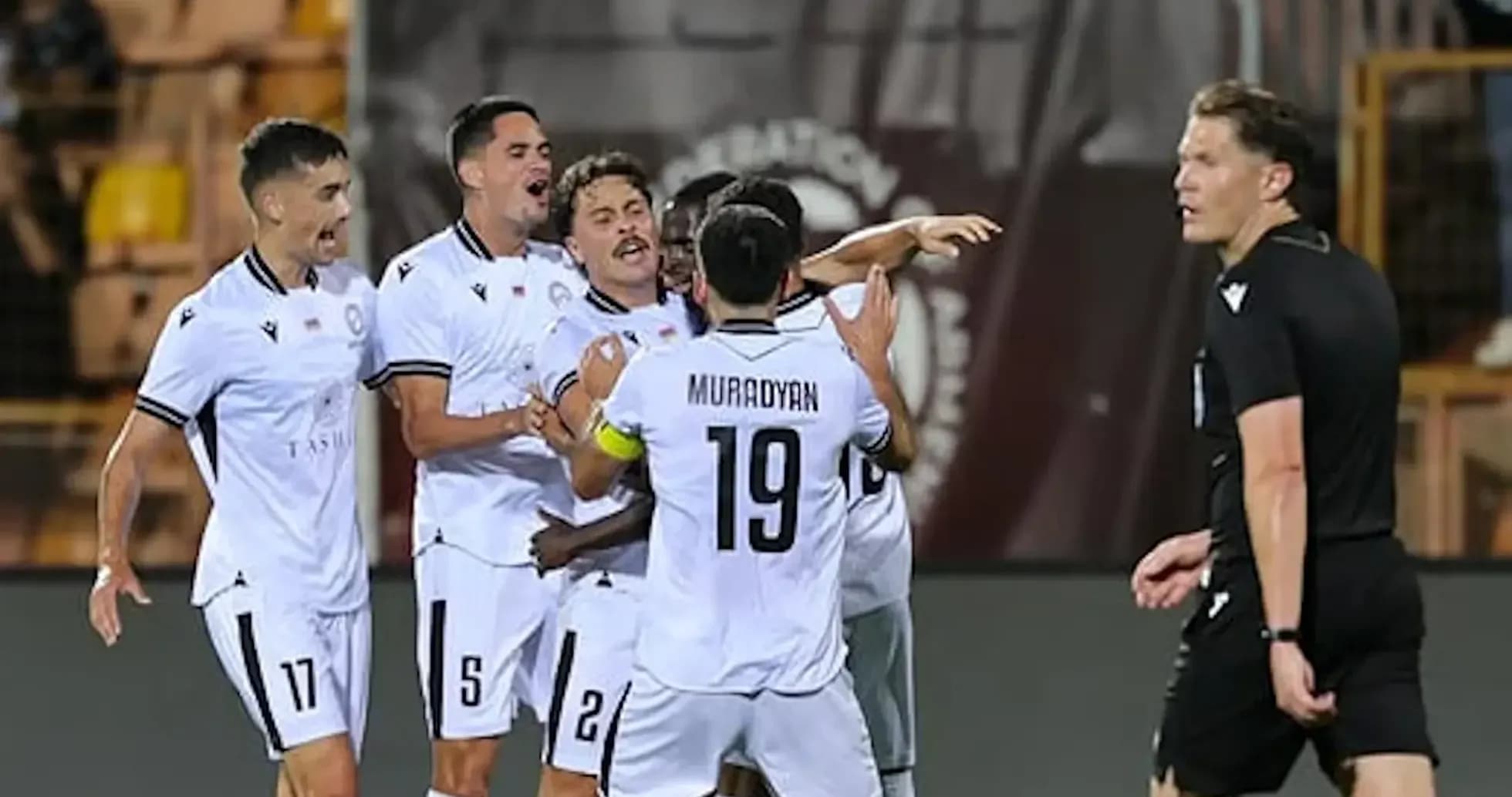 Players celebrating a goal during UEFA match Players celebrating a goal during UEFA match