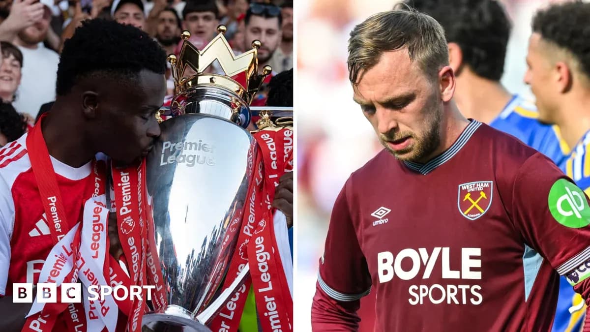 Player holding Premier League trophy, another player looking down Player holding Premier League trophy, another player looking down